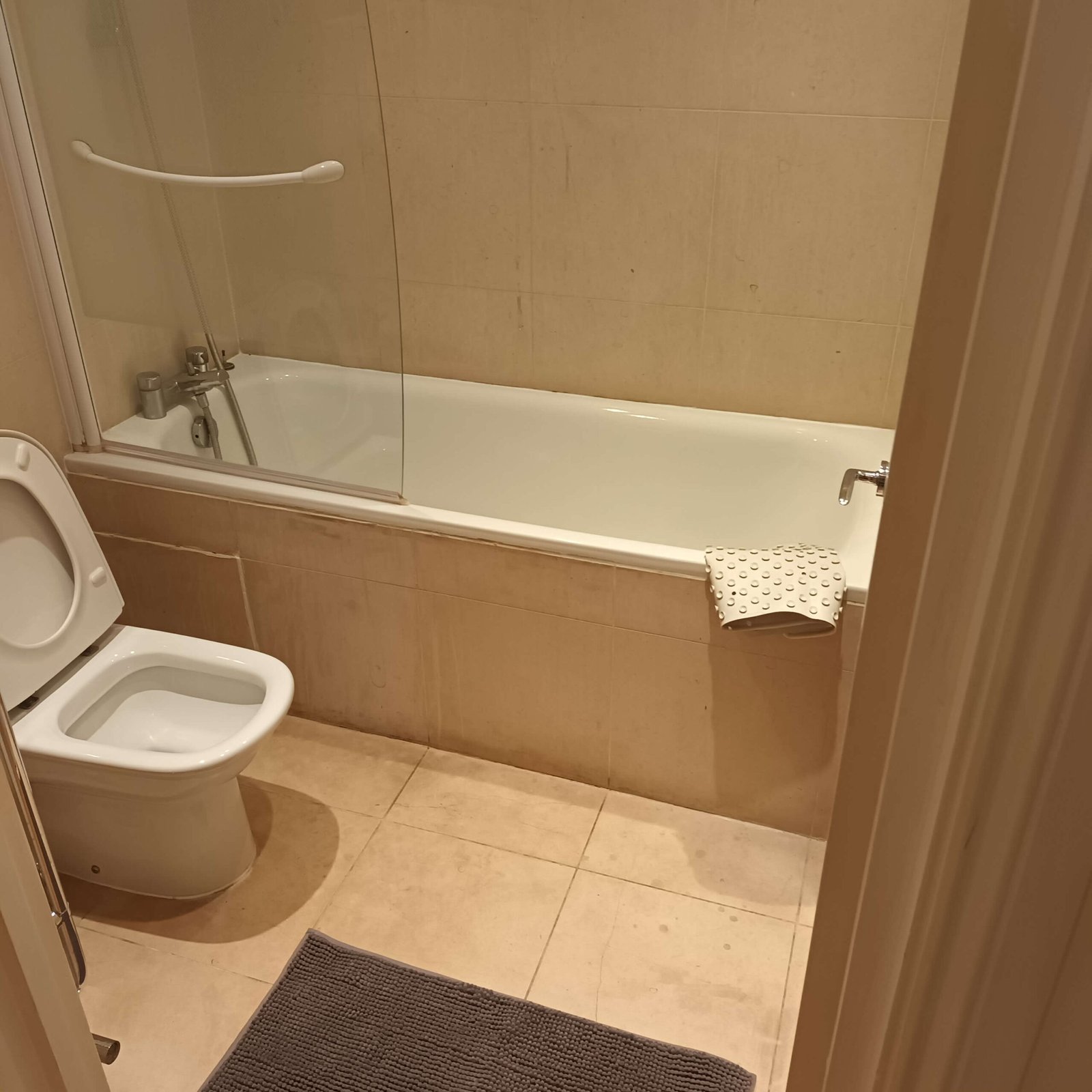 Deep cleaned bathroom with polished chrome and tiles