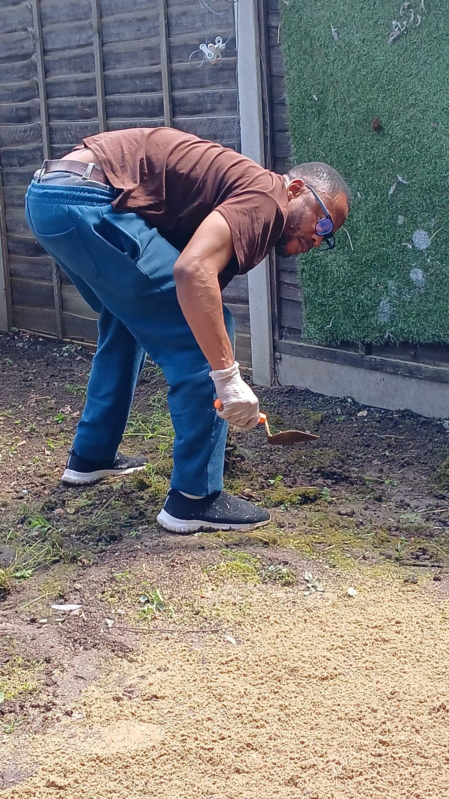Overgrown garden with leaves and debris